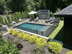 Pool fence installation in Franklin TN by Pool Safety Solutions Removable mesh pool fence in Franklin backyard Pool fence protecting children and pets in Franklin Murfreesboro,TN Fairview,Tn forest hills,tn Oak hill,tn