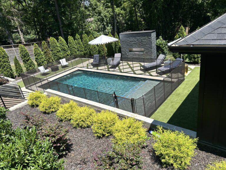 Pool fence installation in Franklin TN by Pool Safety Solutions Removable mesh pool fence in Franklin backyard Pool fence protecting children and pets in Franklin Murfreesboro,TN Fairview,Tn forest hills,tn Oak hill,tn Hermitage,TN Madison,tn