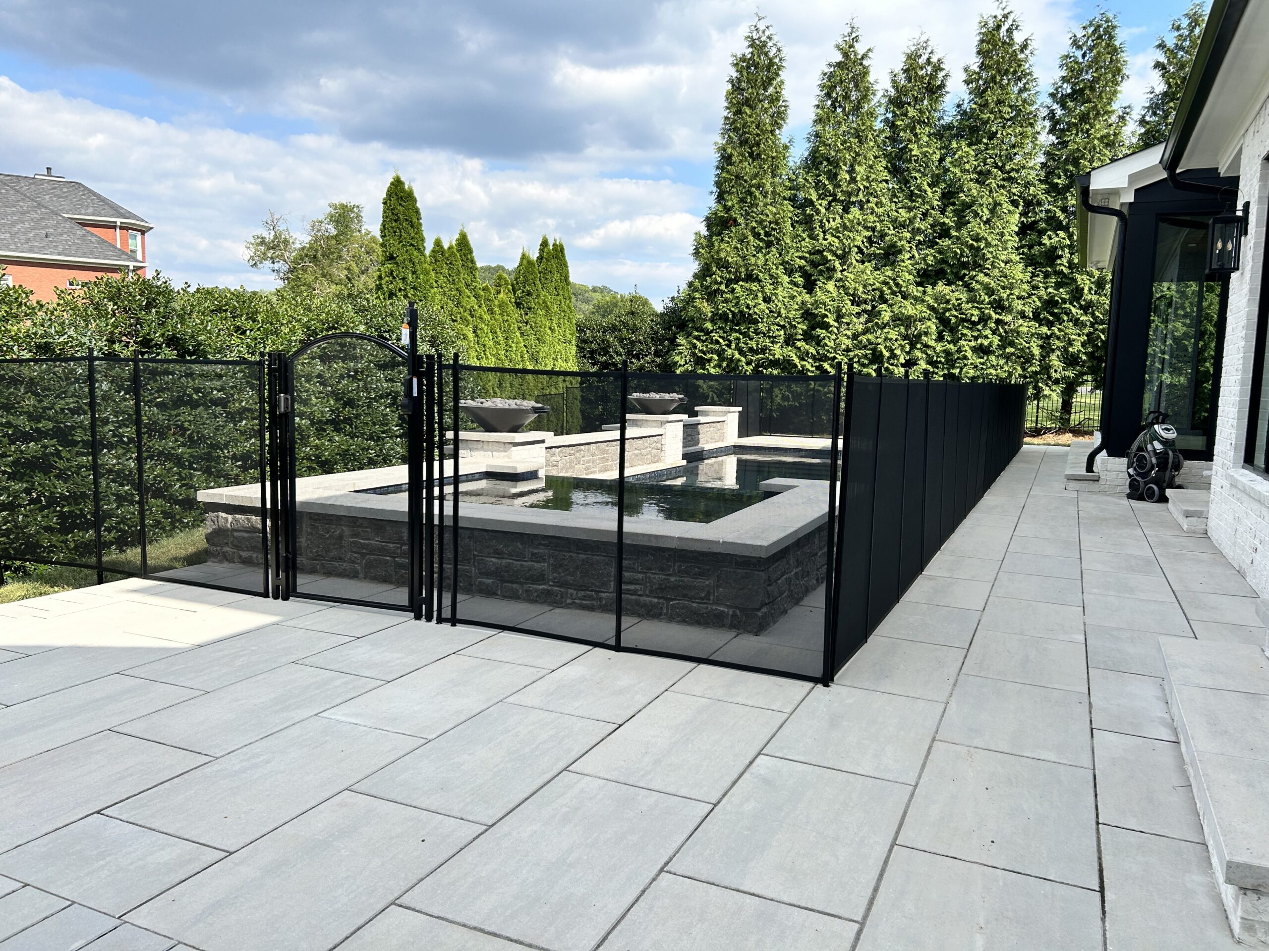 Mesh pool safety fence installation in Middle Tennessee backyard The Nations,Tn Pool Fence installation Davidson County,Tn