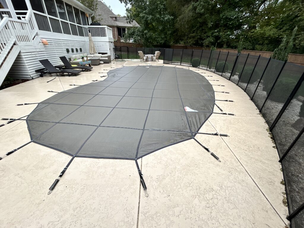 “Pool safety cover installation at a College Grove, TN home protecting children and pets.”
