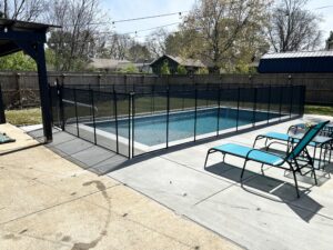 “Request a free pool safety quote in Middle Tennessee” Removable mesh pool fence installed Nashville backyard child and pet safety