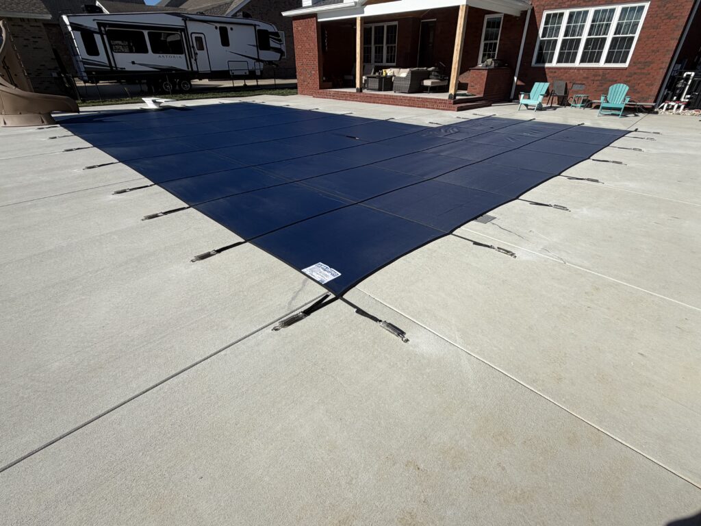 Custom safety pool cover installed in Nashville TN for child and pet protection